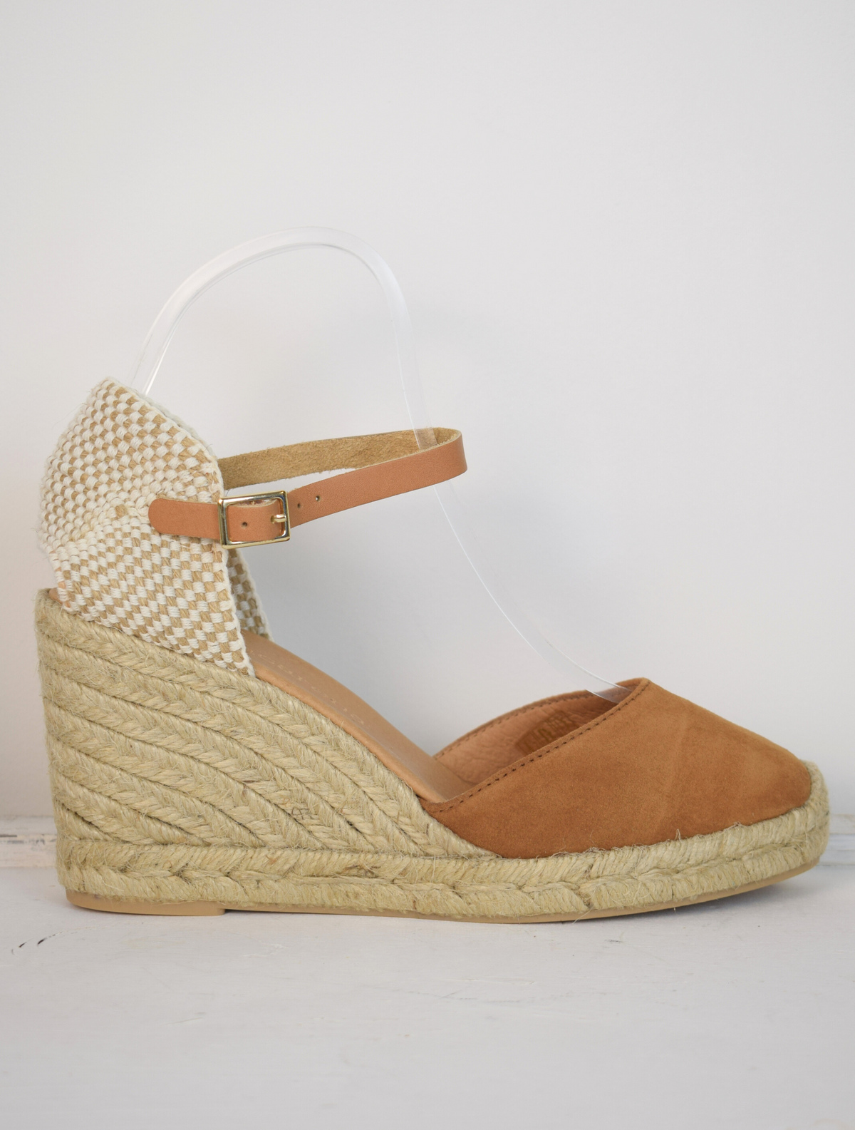 tan coloured wedge sandal with closed toe