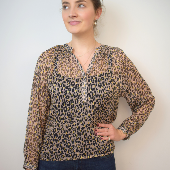 Animal print sheer top with half placket and grandad collar