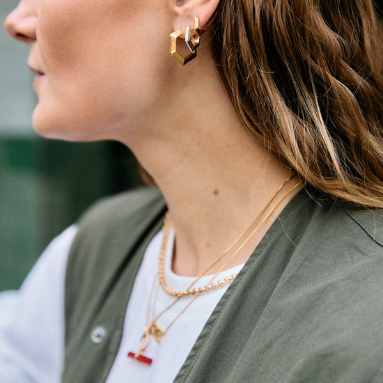 large hexagon shaped hoop gold earrings from rachel jackson model shot