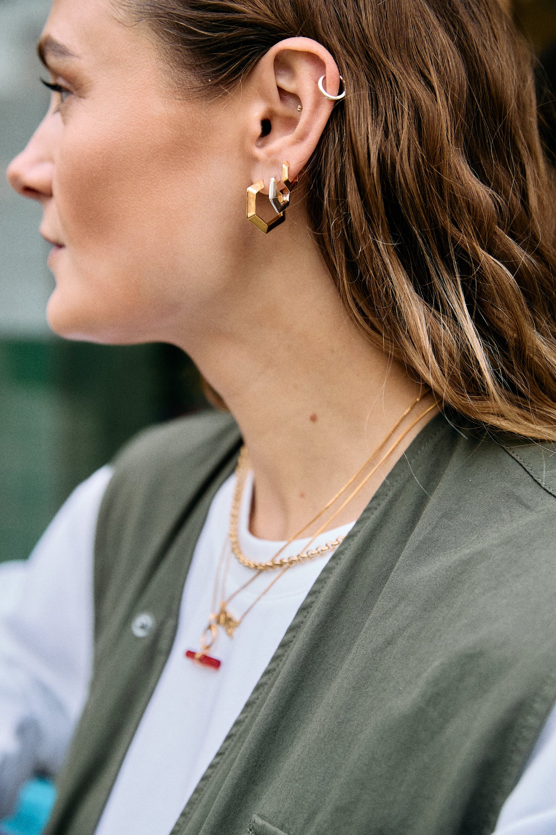 mini hexagon silver shaped hoops from rachel jackson model shot