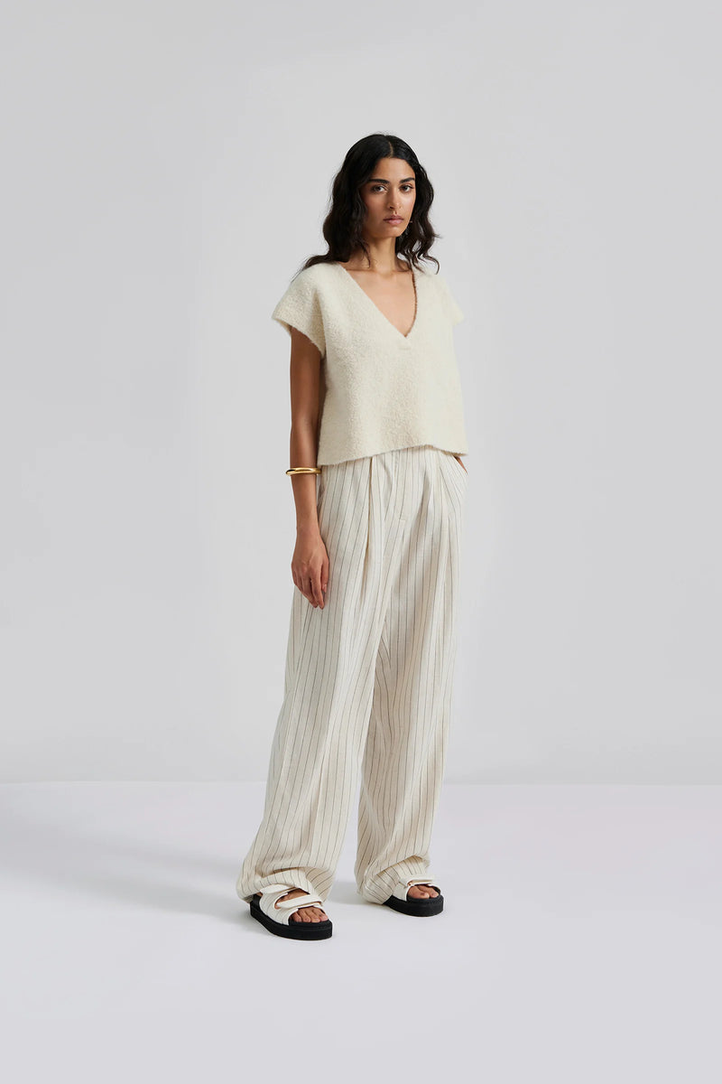 Ecru pinstripe linen trousers with pleated front
