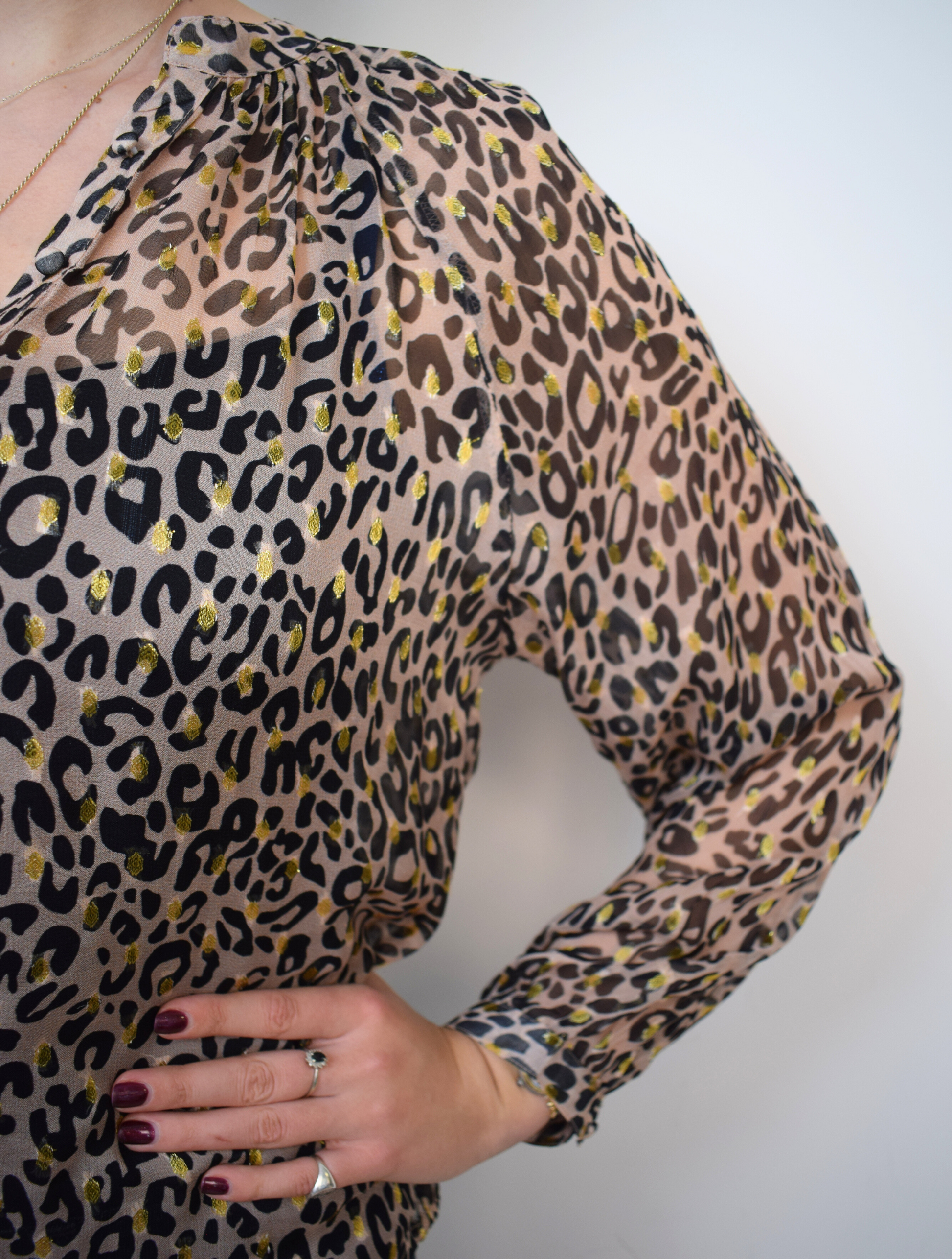 Animal print sheer top with half placket and grandad collar