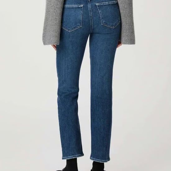 mid blue slim jeans from paige  rear