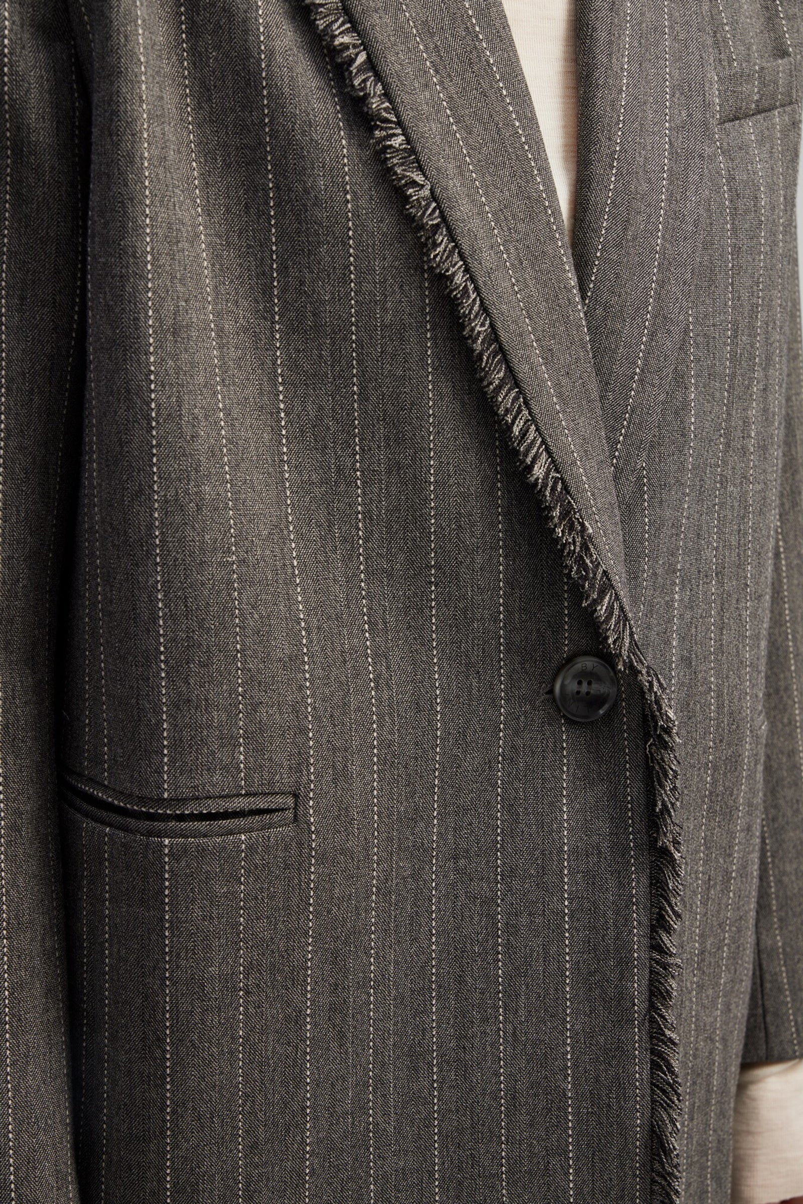 Grey single breasted pinstripe blazer with fringe detail