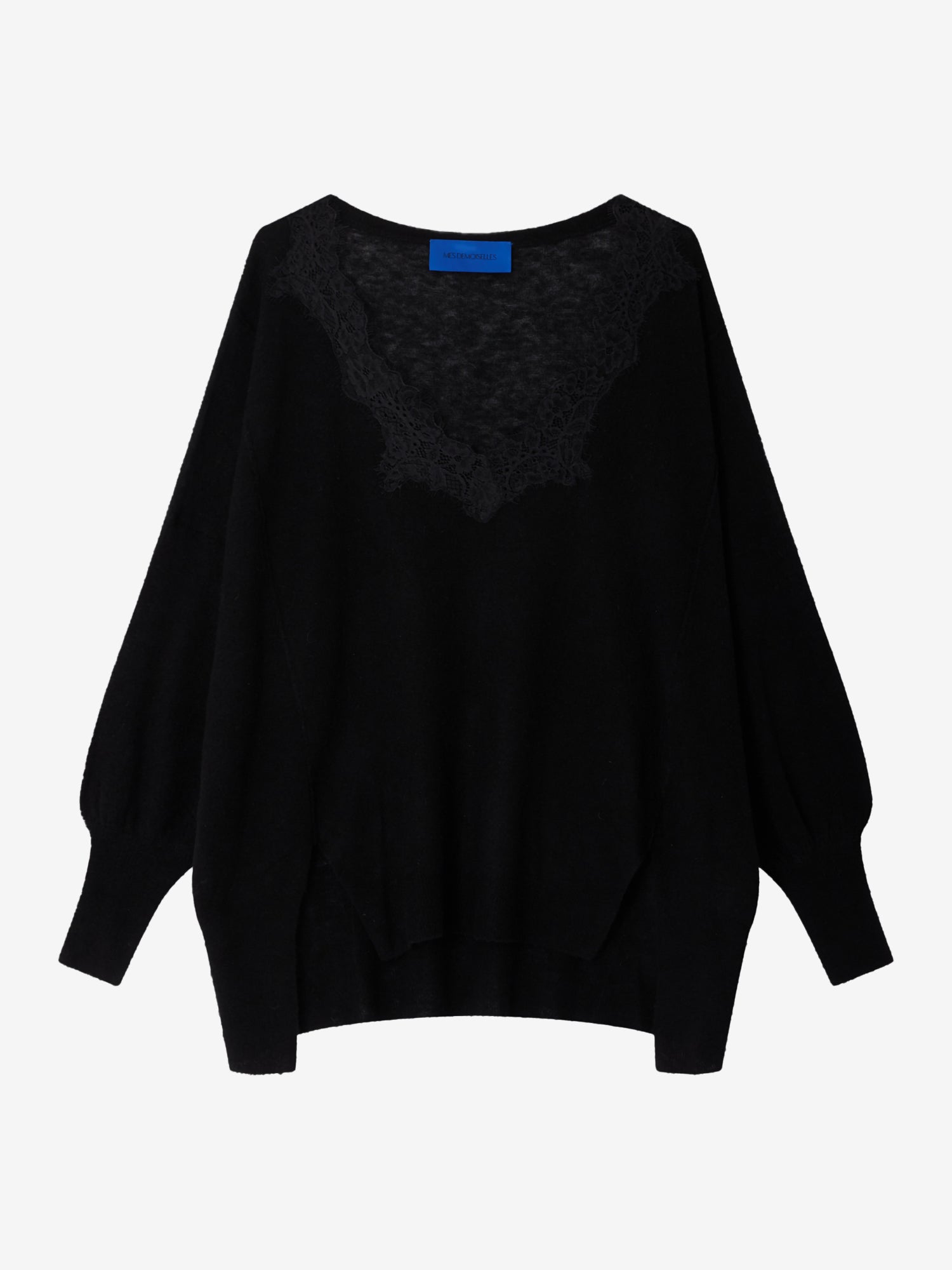 Black sweater on a light gray background