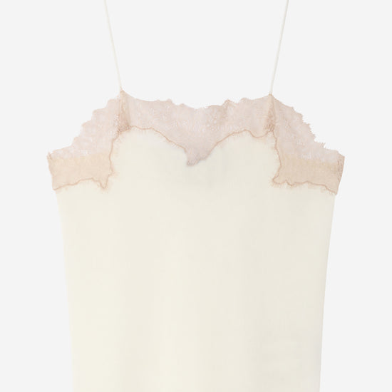 cream cami with light brown lace on the top on white background