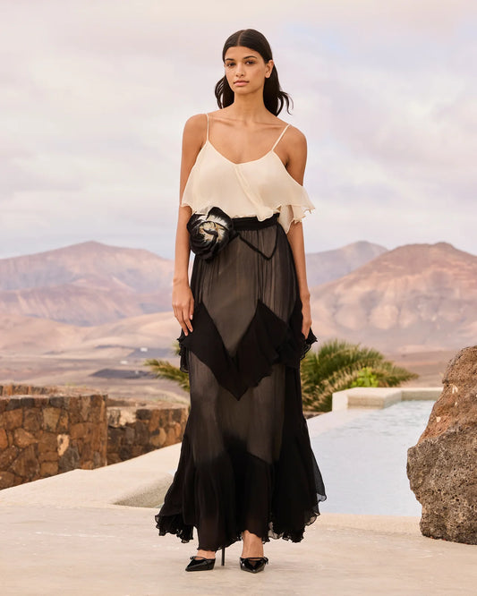 two tone dress on model with spaghetti straps and removable floral belt detail