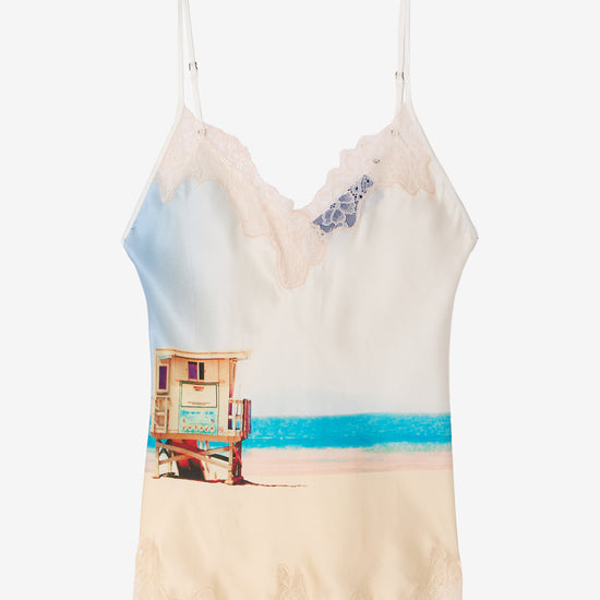 Cami with beach print and lace neckline on a white background
