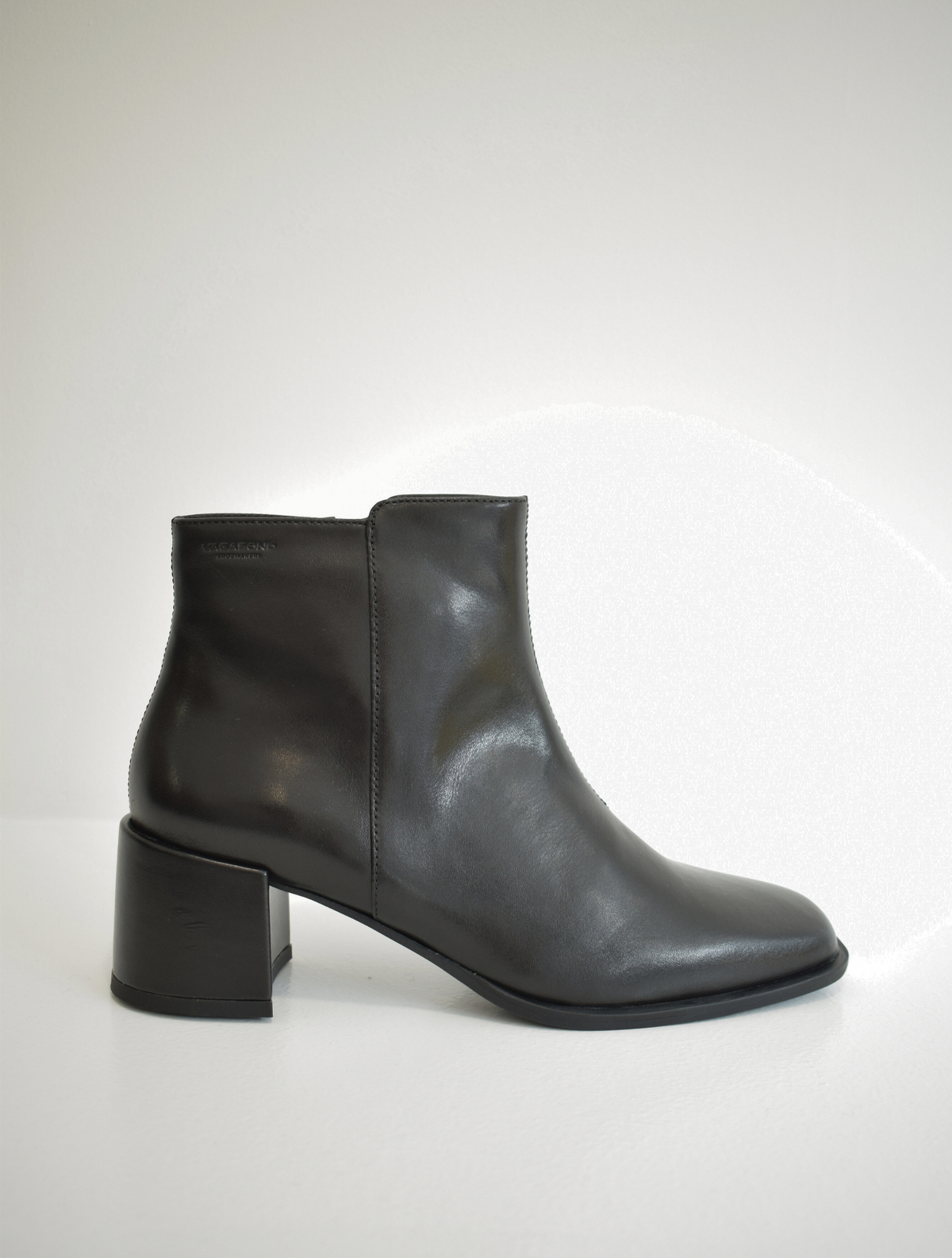 Black ankle boot with leather wrapped block heel and zip fastening