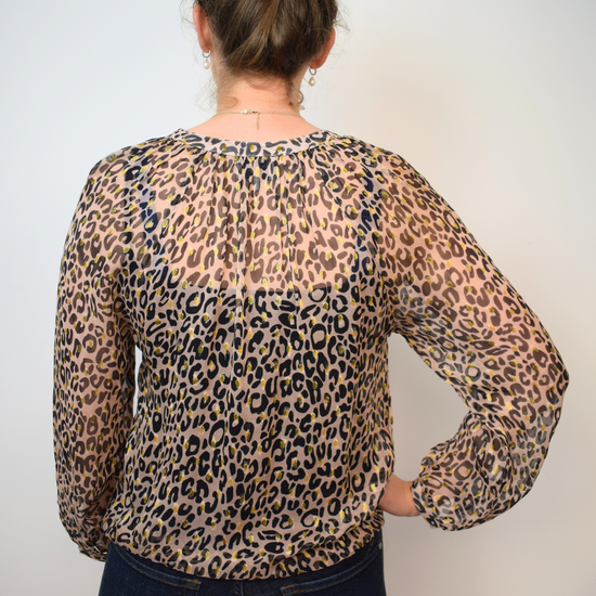 Animal print sheer top with half placket and grandad collar