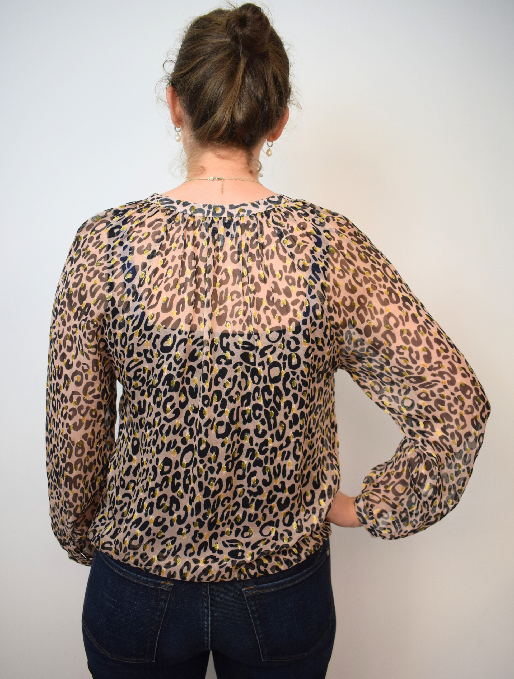 Animal print sheer top with half placket and grandad collar