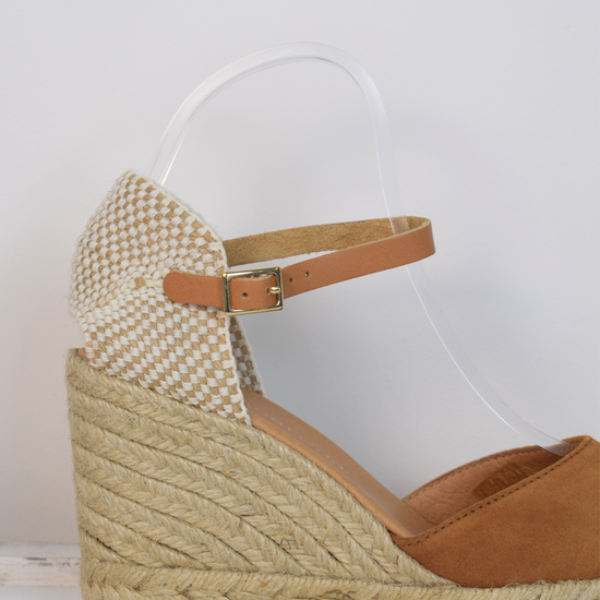 tan coloured wedge sandal with closed toe