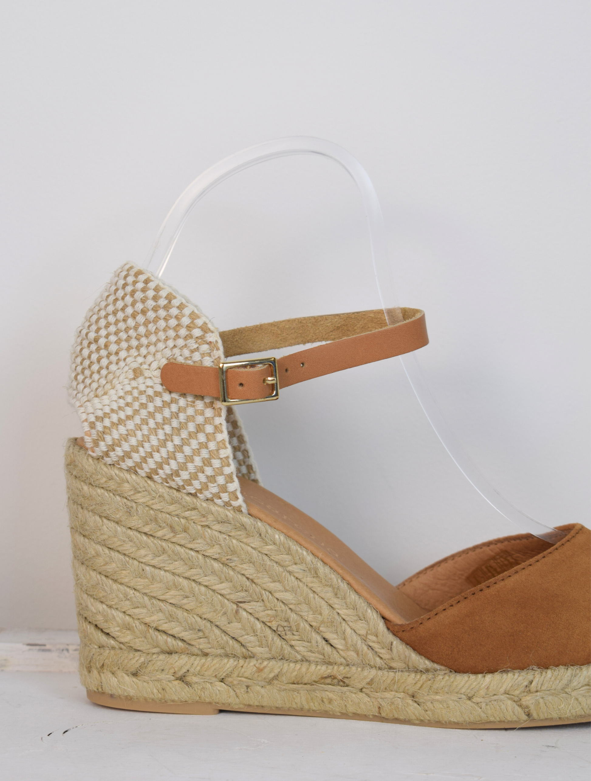 tan coloured wedge sandal with closed toe