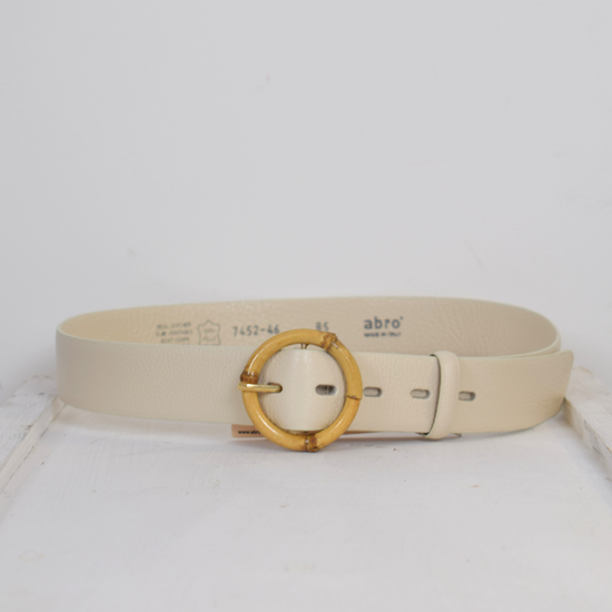 Cream belt with circular buckle 