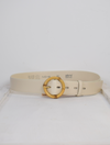 Cream belt with circular buckle 