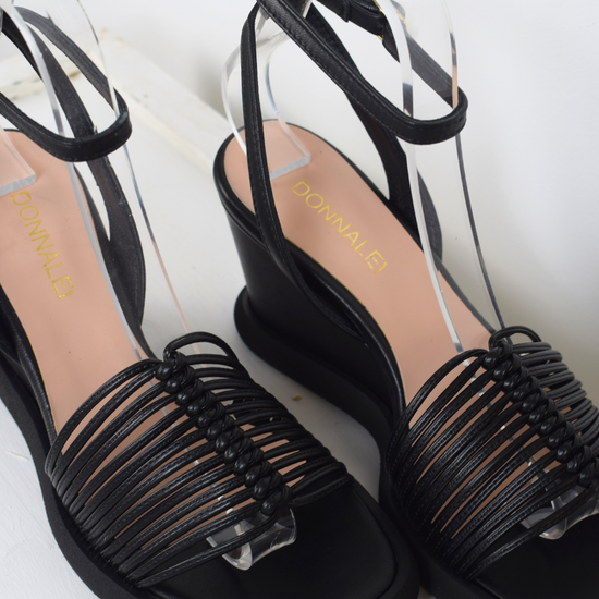 Black strappy wedges with moulded sole