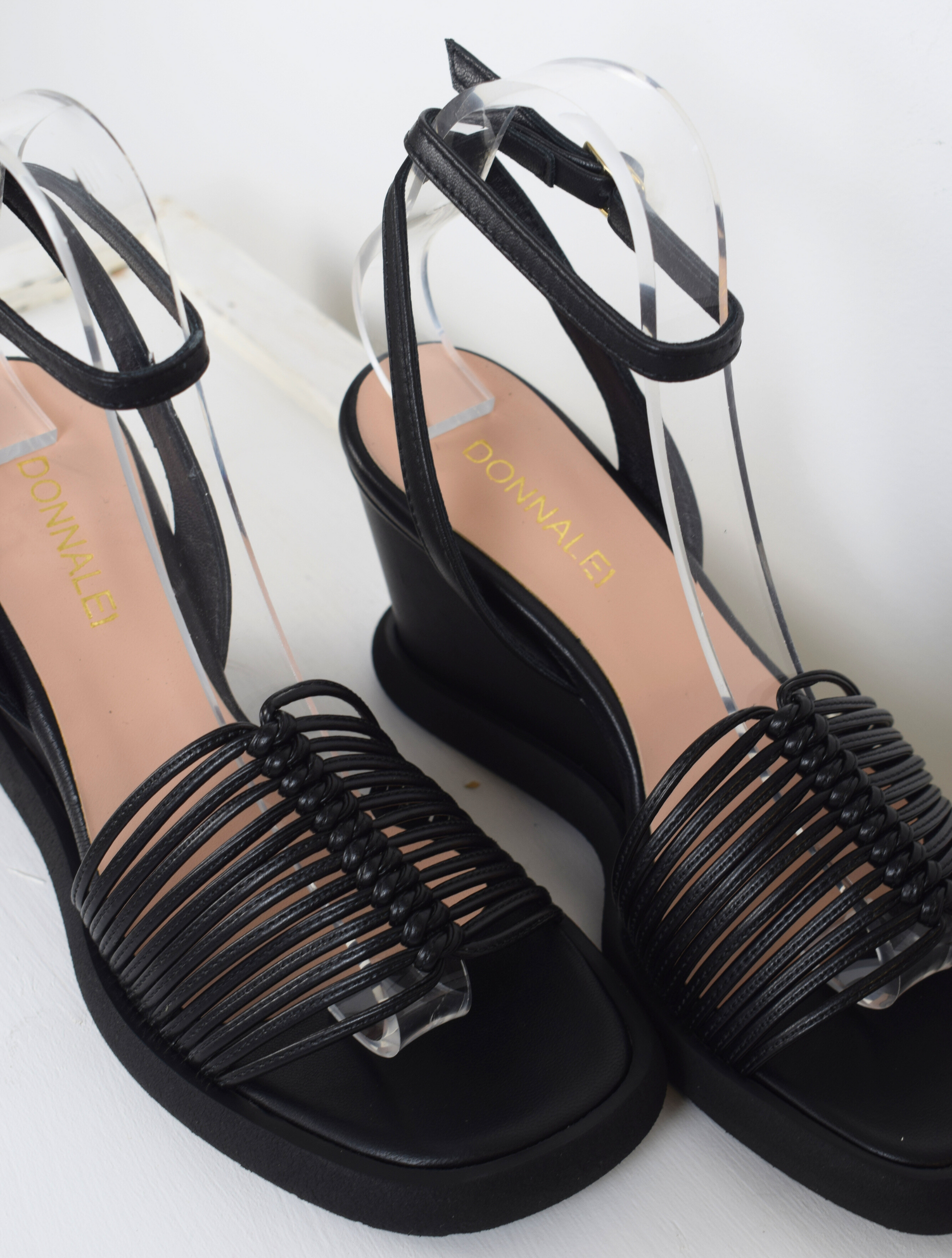 Black strappy wedges with moulded sole