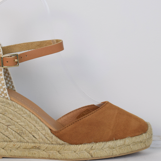 tan coloured wedge sandal with closed toe