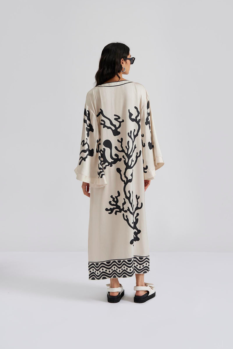 Ivory kaftan with side splits and wide fluted sleeves with black coral design