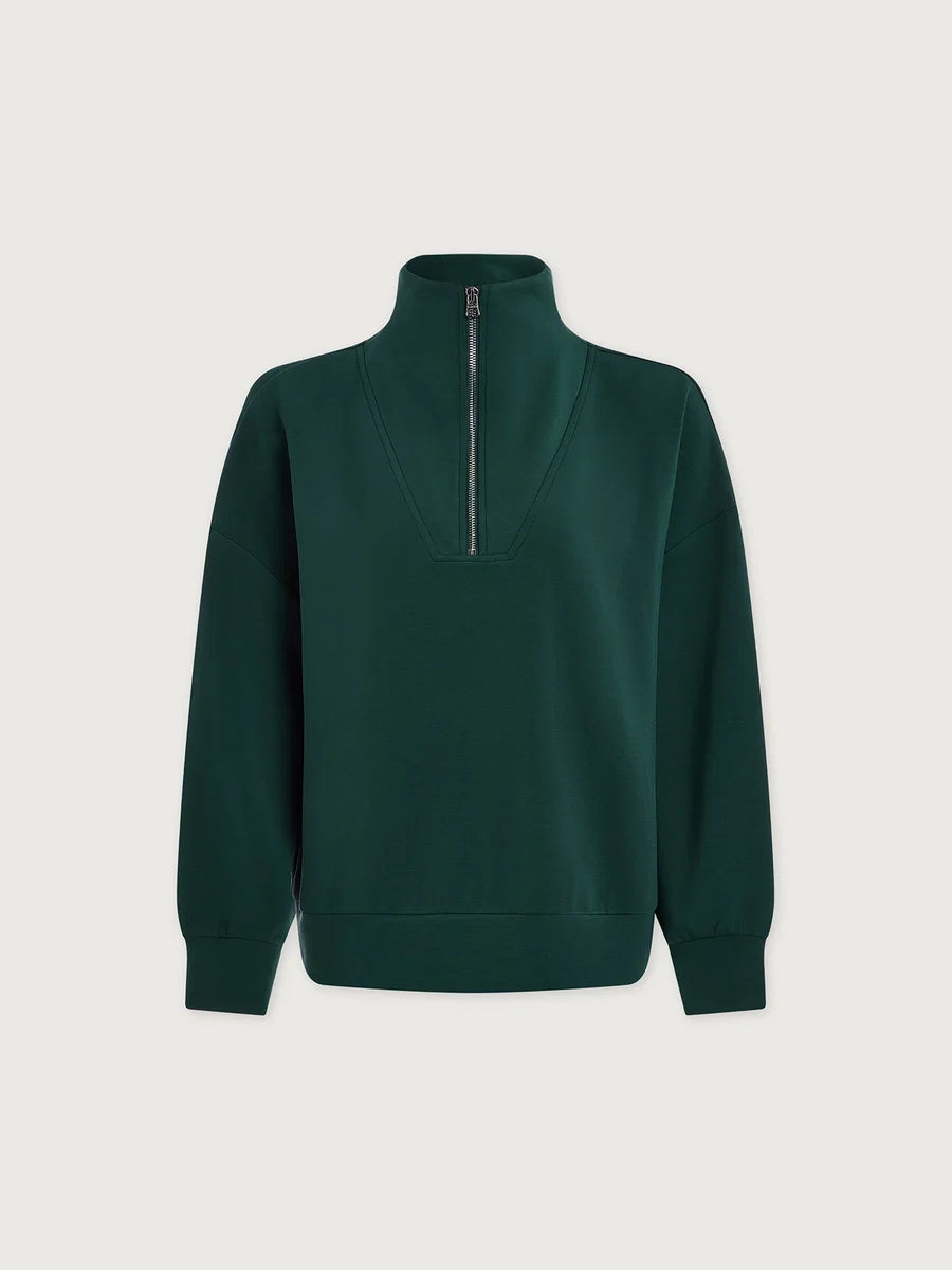 A dark forest green long-sleeve quarter-zip sweatshirt with a mock neck collar, displayed on a light gray background.