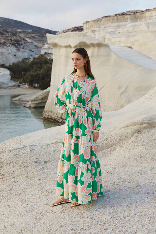 Green dress with bold floral all over design in light green, lavender and blush pink