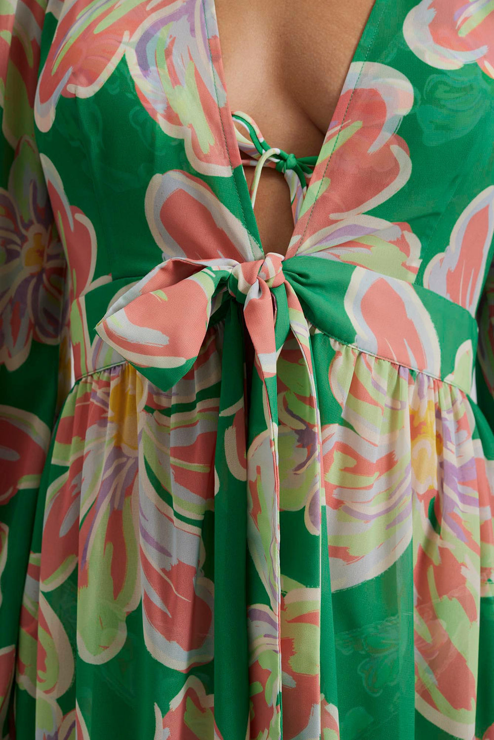 Green and soft pastel floral printed beach cover-up wiht long sleeves tie waist and ruffle details with V neckline