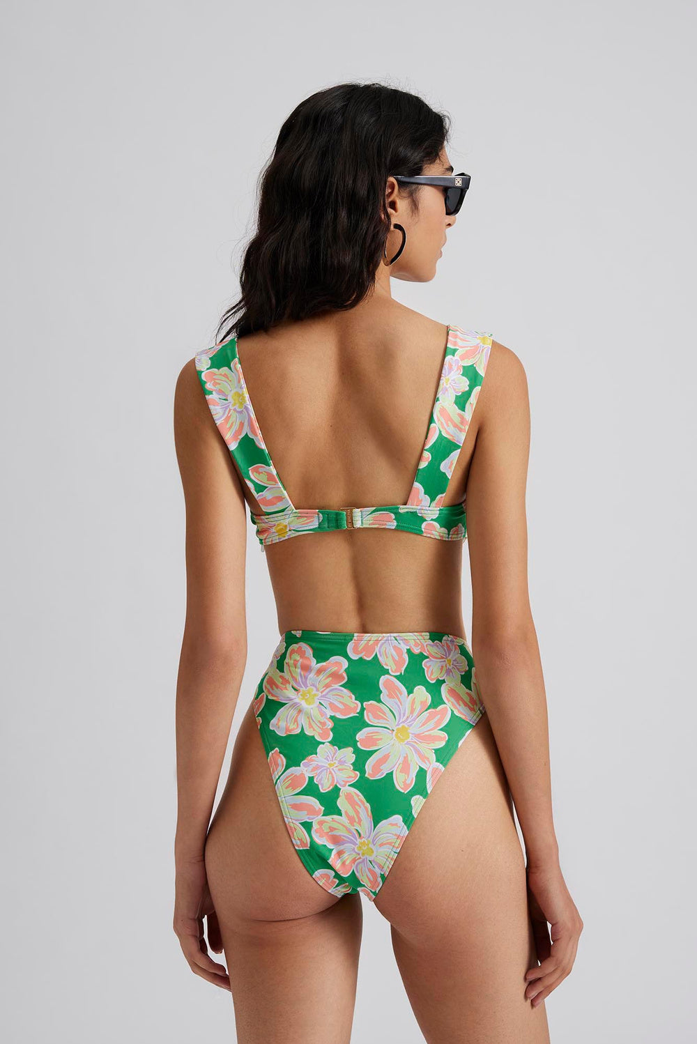 Green and floral print underwired bikini top with wide straps and a clip fasetening