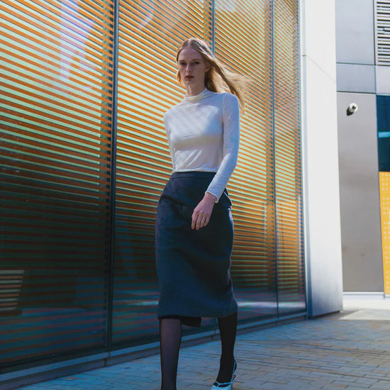 super soft long sleeve off white top with high round neck model shot