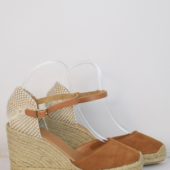 tan coloured wedge sandal with closed toe