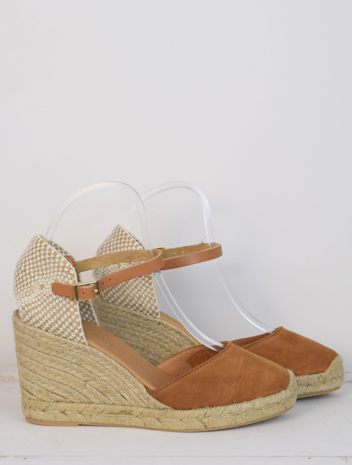 tan coloured wedge sandal with closed toe