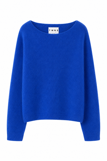 A bright royal blue knit sweater with a wide boat neckline and long sleeves, shown against a plain white background. The brand label 'T W N S' is visible inside the collar.