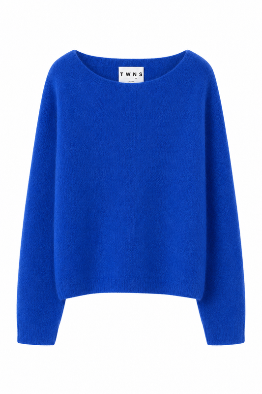 A bright royal blue knit sweater with a wide boat neckline and long sleeves, shown against a plain white background. The brand label 'T W N S' is visible inside the collar.