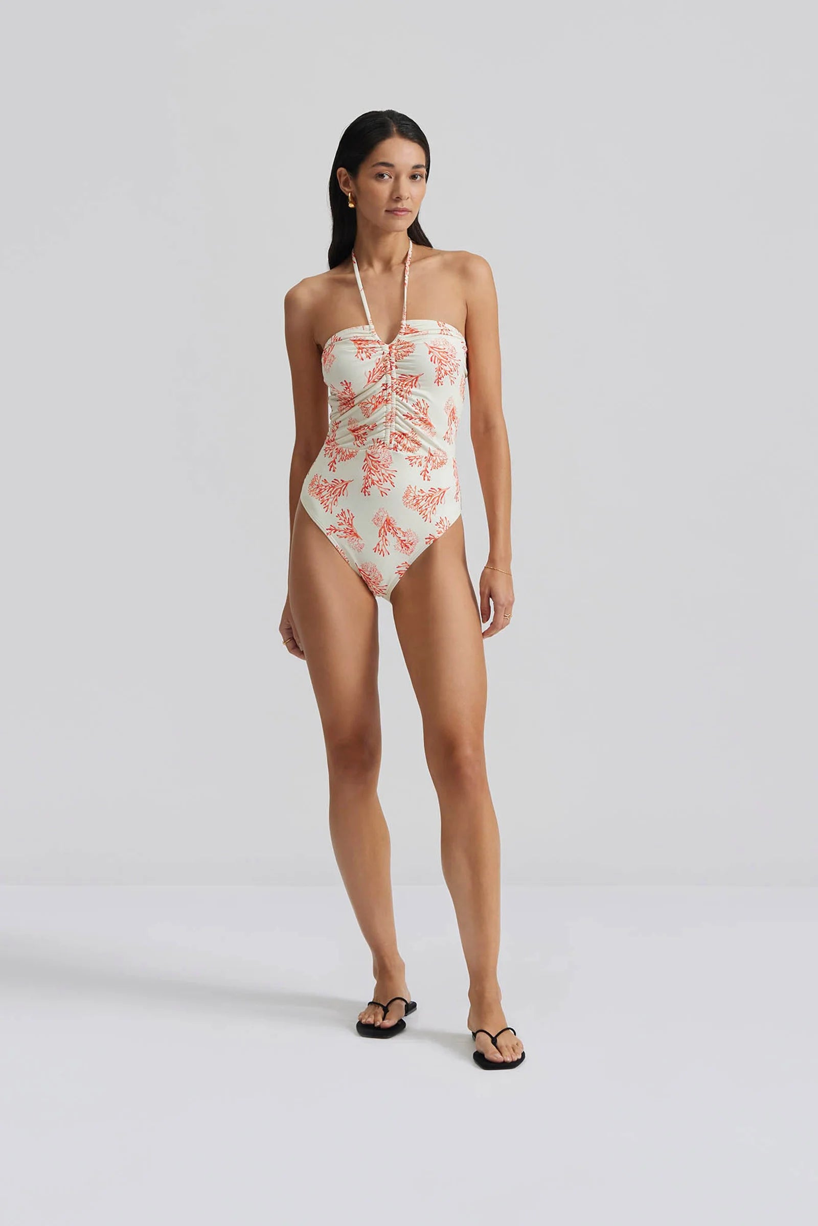 V neck halterneck ecru swimsuit with orange/red coral print 