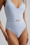 Baby blue V neck and back swimsuit in textured fabric with tie straps and belt