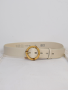 Cream belt with circular buckle