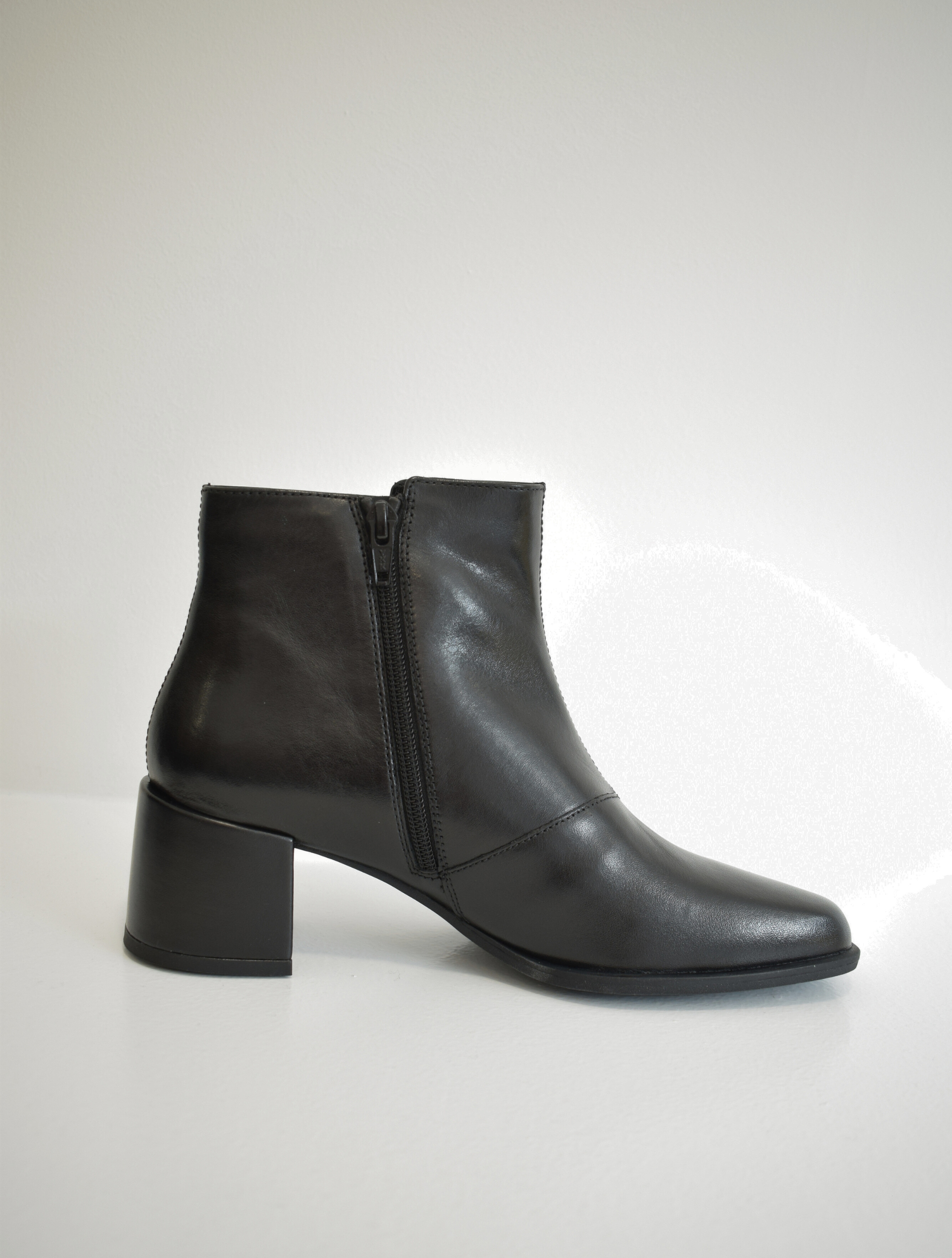 Black ankle boot with leather wrapped block heel and zip fastening