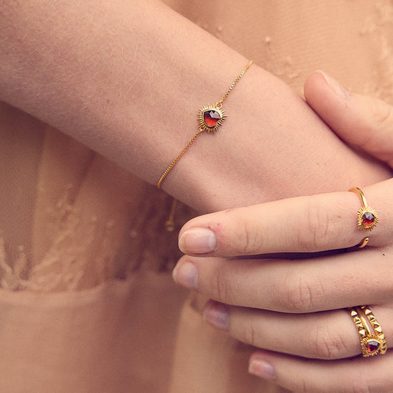 heart shaped spiky ring with red stone and adjustable band from rachel jackson model shot