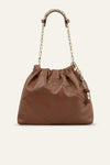 Brown leather handbag with chain handle on a beige background from bash