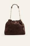 Brown suede handbag with gold chain handle on a white background