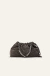 Dark gray clutch bag with chain detail on a beige background from ba&sh