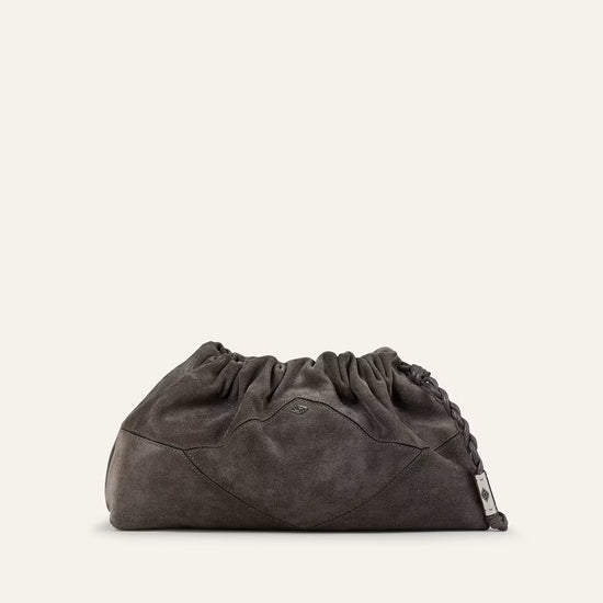 Dark gray clutch bag on a beige background from ba&sh
