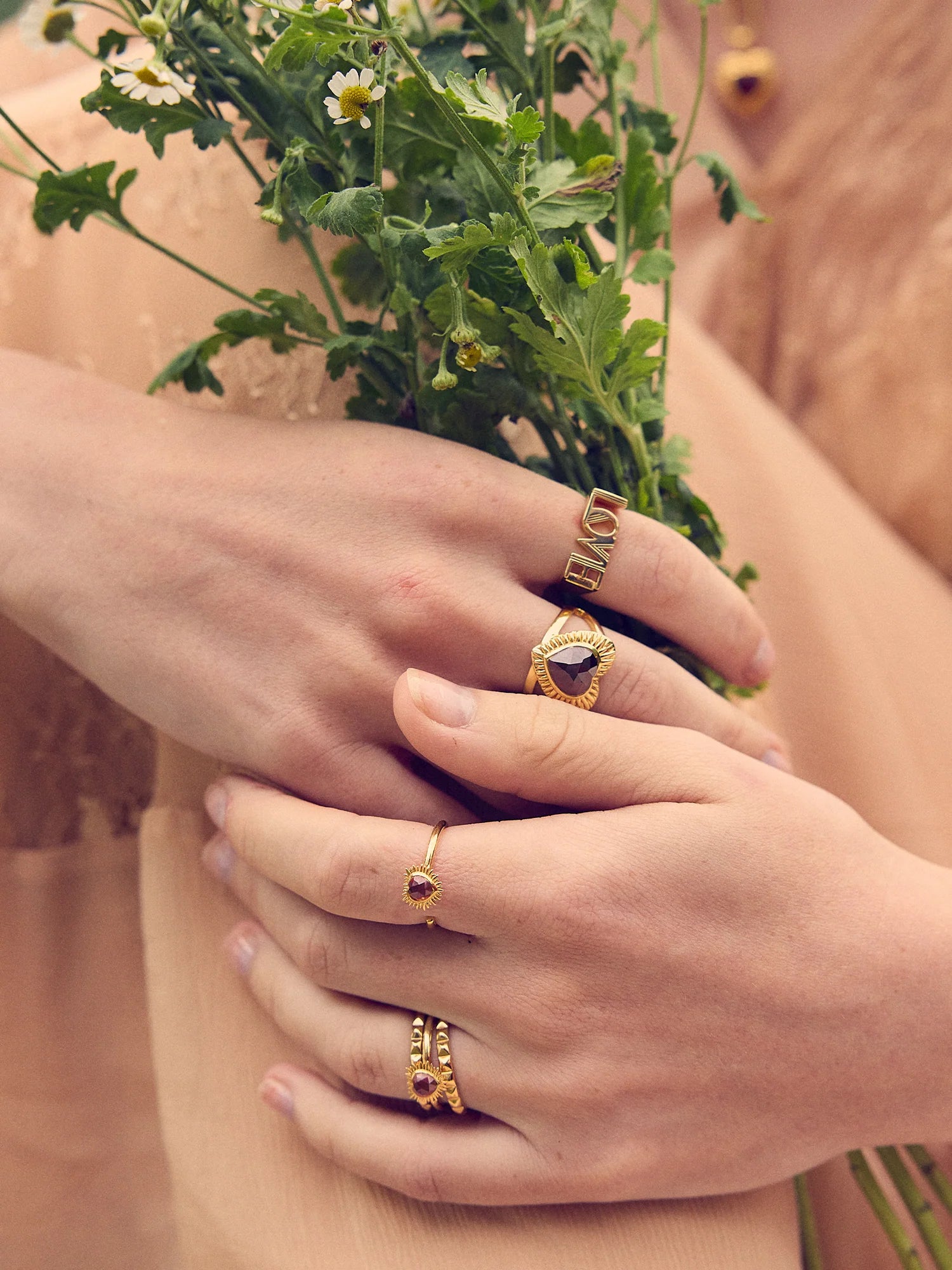 heart shaped spiky ring with red stone and adjustable band from rachel jackson model shot