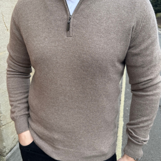 male model wearing brown cashmere quarter zip jumper.