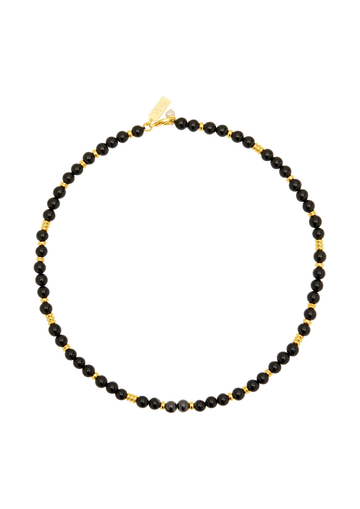 A beaded necklace featuring small, faceted black beads separated by tiny gold spacers, with a gold clasp, shown on a plain white background.