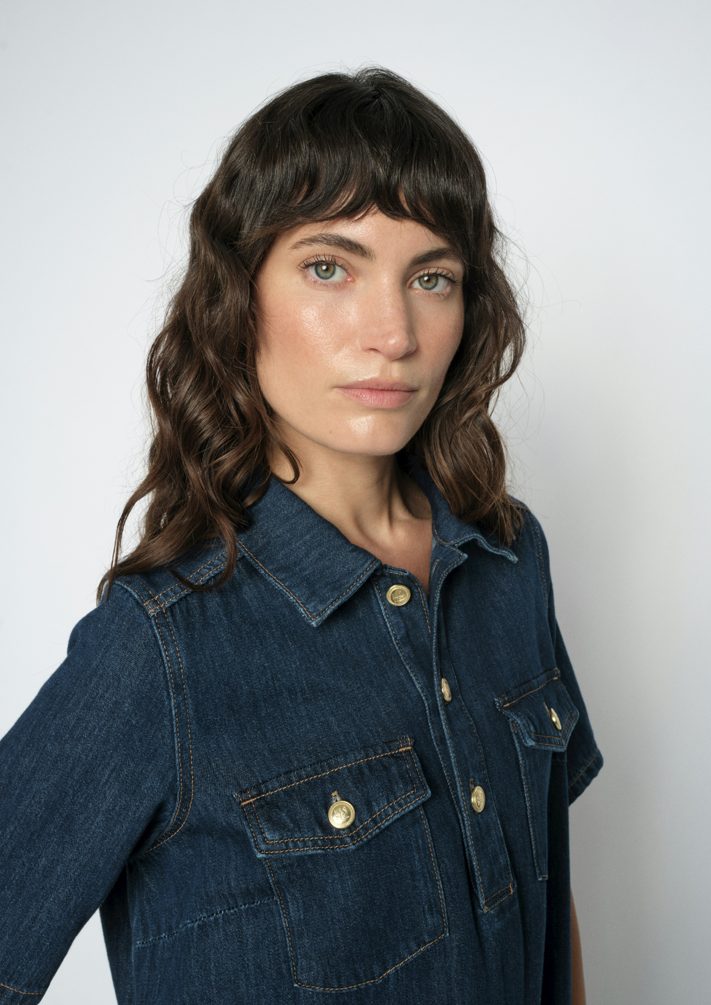 woman wearing denim dress close up