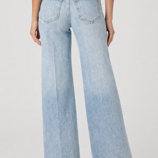 blue jeans on model on plain background