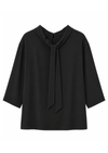 A black long-sleeve blouse with a wide draped collar and a front tie detail, shown against a plain white background.