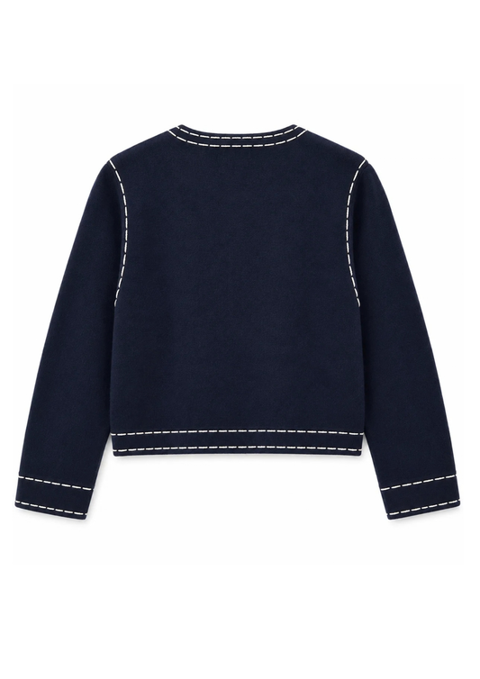 A navy long-sleeve cropped knit sweater with a wide boat neckline and ribbed cuffs, displayed against a plain white background.