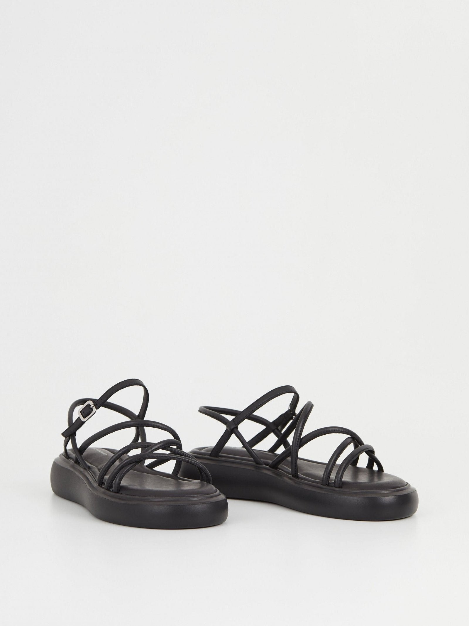 Black strappy chunky sole leather sandals