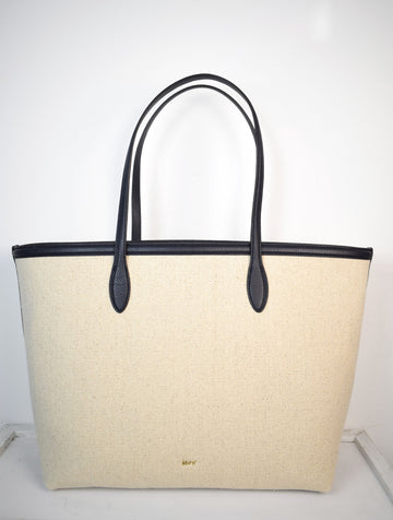 Natural fabric shopper with navy leather trim and internal zippable pouch pocket detail